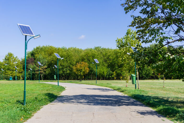 Park alley illuminated by solar powered street lights in Tineretului Park, (Solar-Powered Lighting)