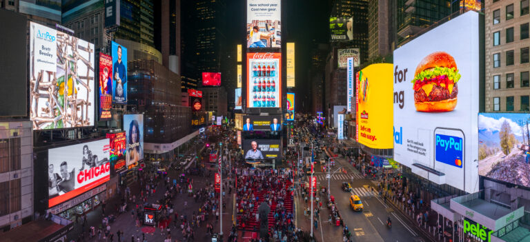 Digital signage in Times Square at night. Shows Digital Signage Management