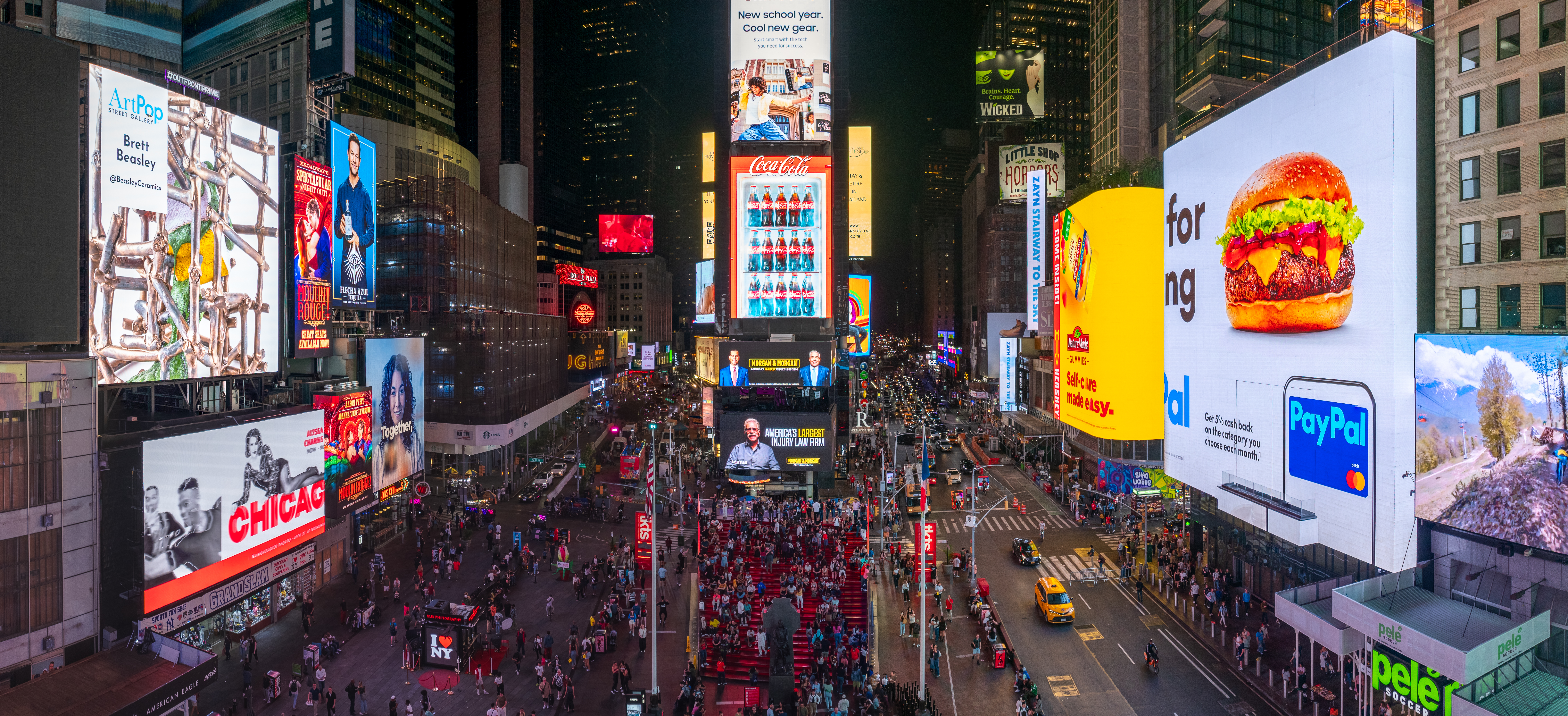 Digital signage in Times Square at night. Shows Digital Signage Management