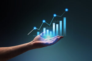 Businessman hand showing business finance and economy graphs. Digital investment concept. Finance and investment graph. Financial chart